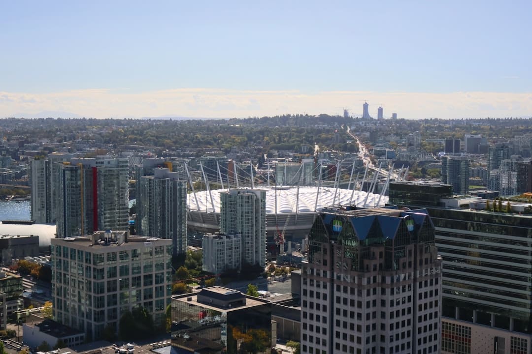 alberta support animal. An aerial view of a city with tall buildings