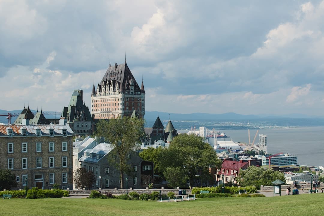 French-language support animal — Fairmont le château frontenac hotel overlooking quebec city harbor