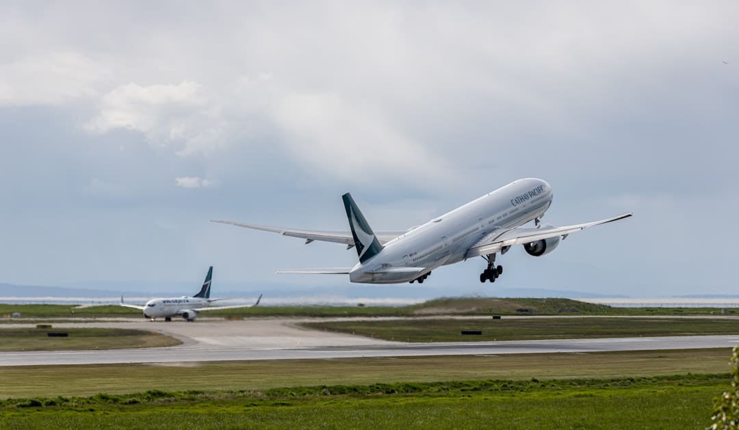 accessible transportation — Airplanes taking off from a runway under cloudy skies